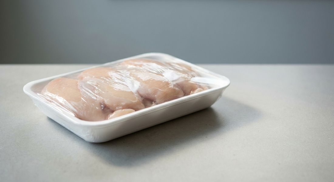 Raw chicken breast fillets in a supermarket tray, not allowed on the Tayyibat diet