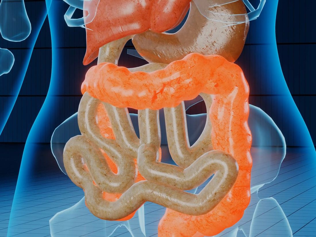 An X-ray style view of the digestive system, with the colon glowing orange