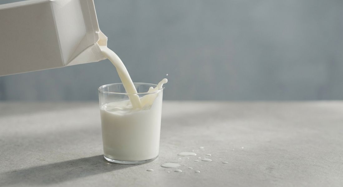 Milk pouring from a carton into a glass, not allowed on the Tayyibat diet